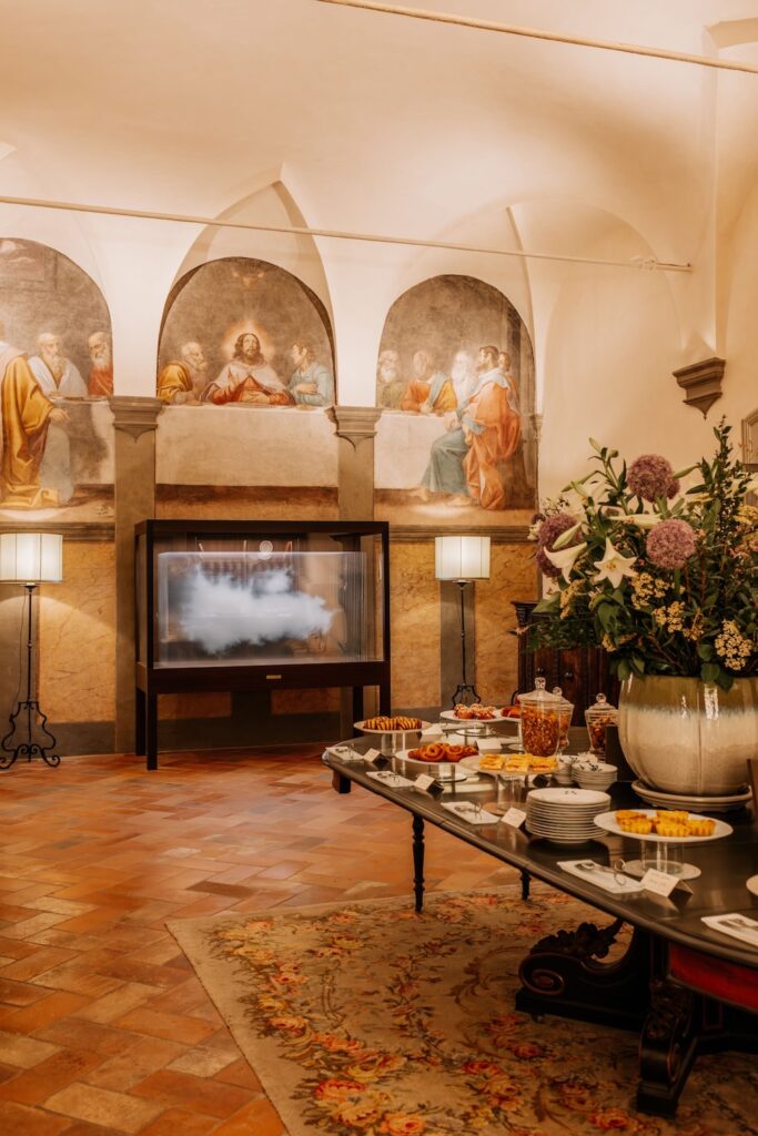 A buffet breakfast in the monastery's former refectory is laid beneath a dramatic Last Supper fresco