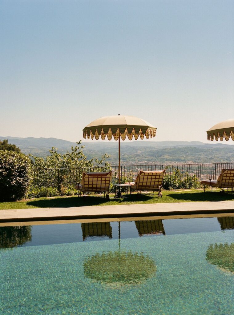 The hotel's main pool overlooks Florence;